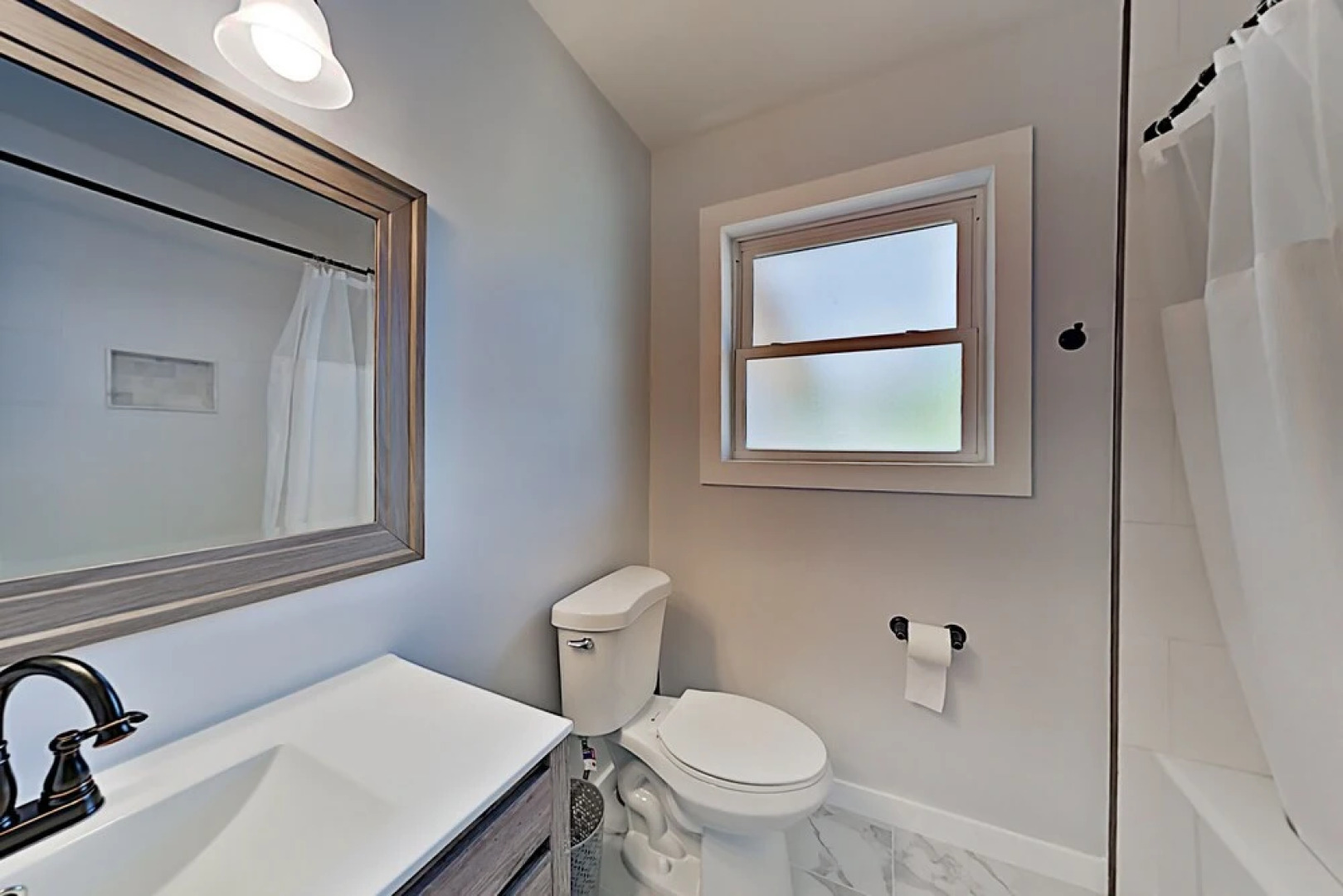 Charming Getaway W/ New Kitchen & Private Backyard 3 Bedroom Home