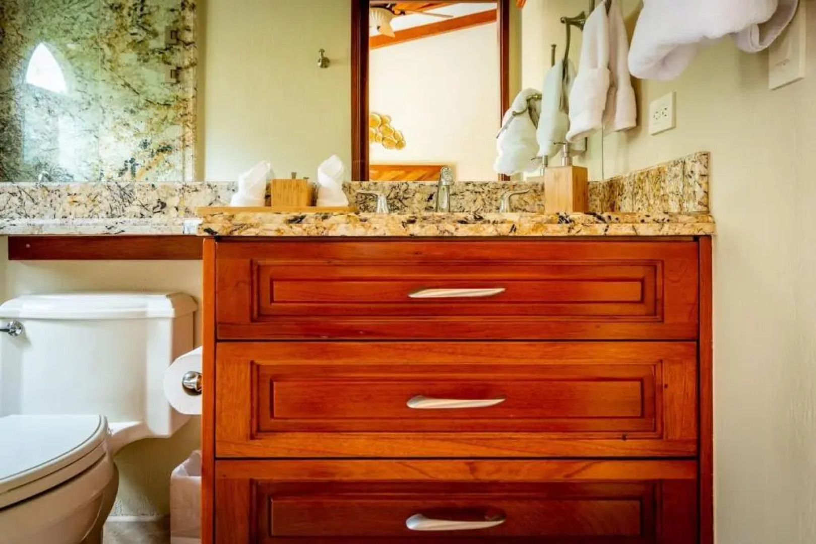 Stylish Split-Level Condo with a Shaded Terrace, Direct Beach Access, and Resort-Style Community Amenities