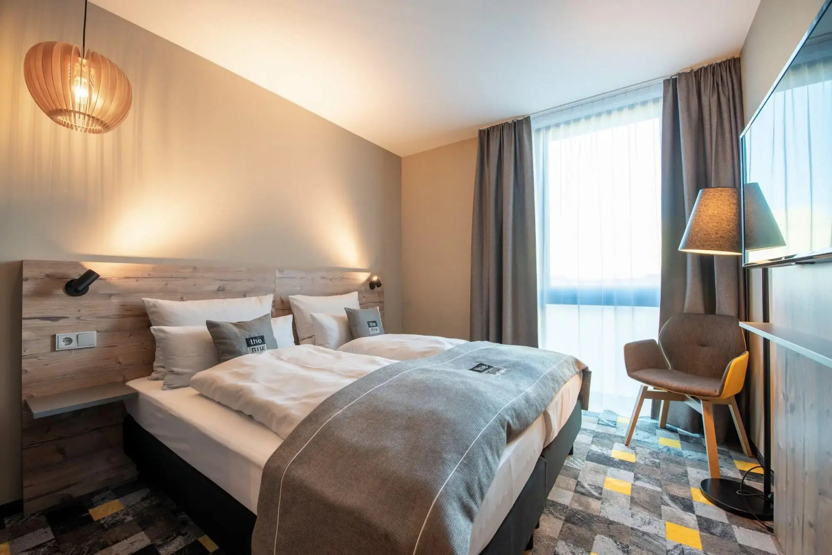 Отель Holiday Inn - the niu, Timber Esslingen, an IHG Hotel