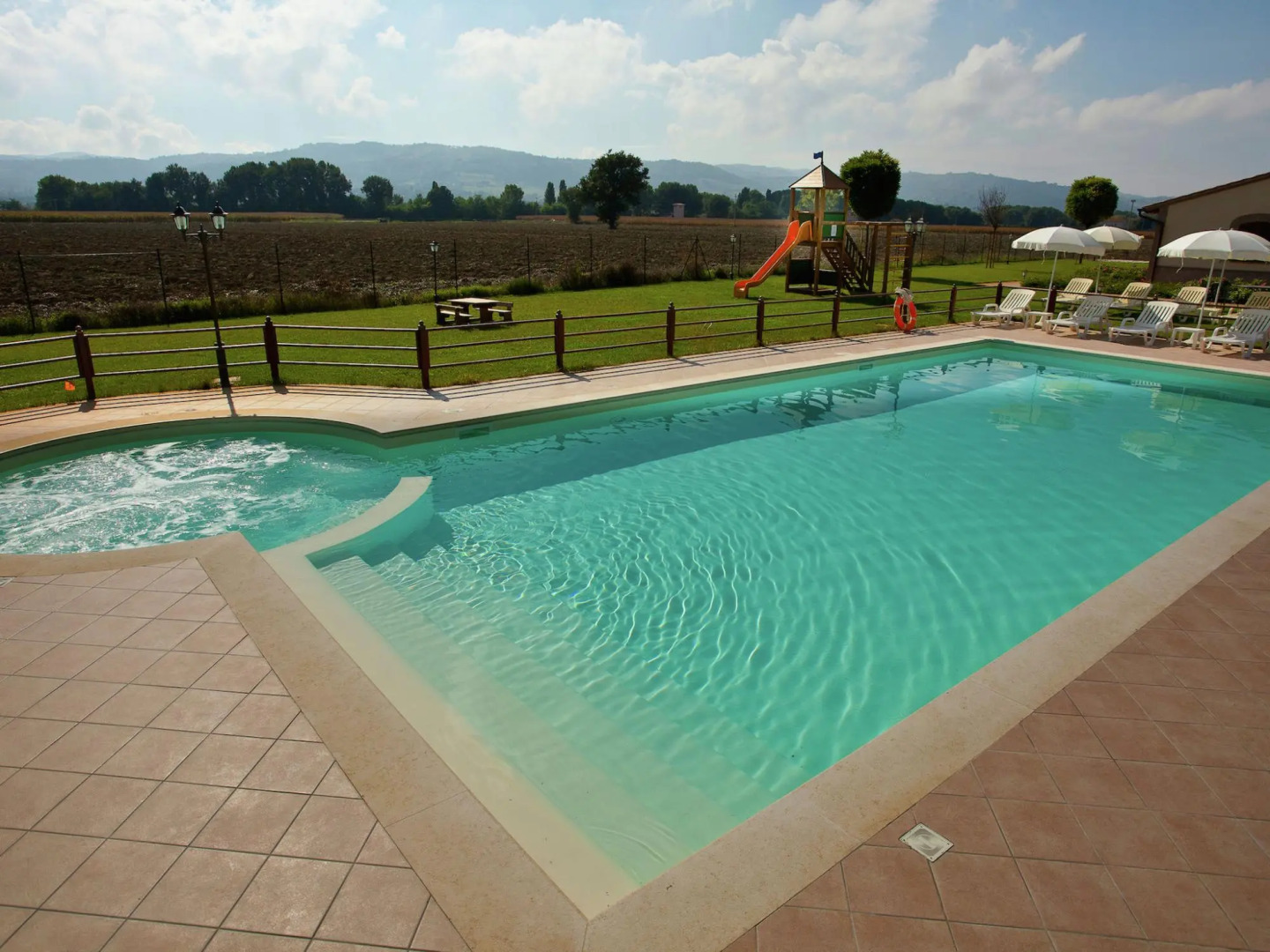 An agritourism complex with views of Assisi.