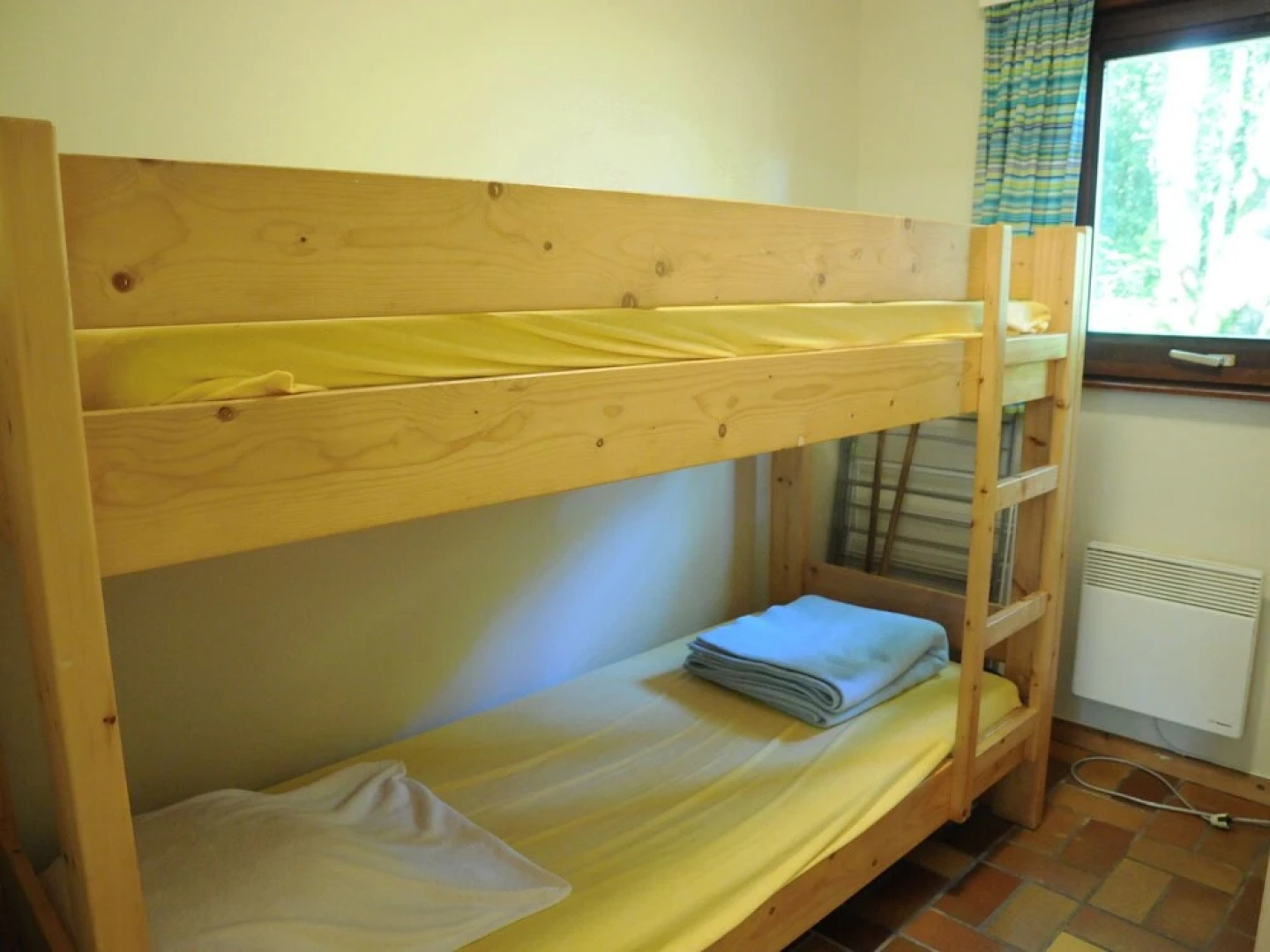 Wooden Chalet With Stove and Microwave Located in the Forest