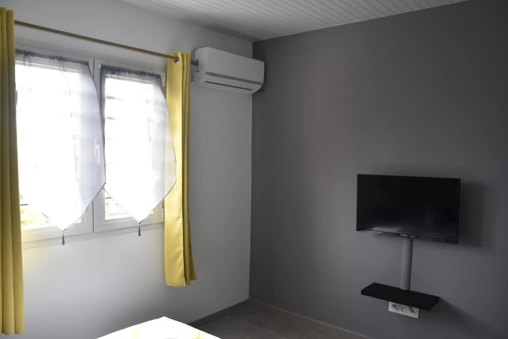 Haut de villa dans son écrin de verdure