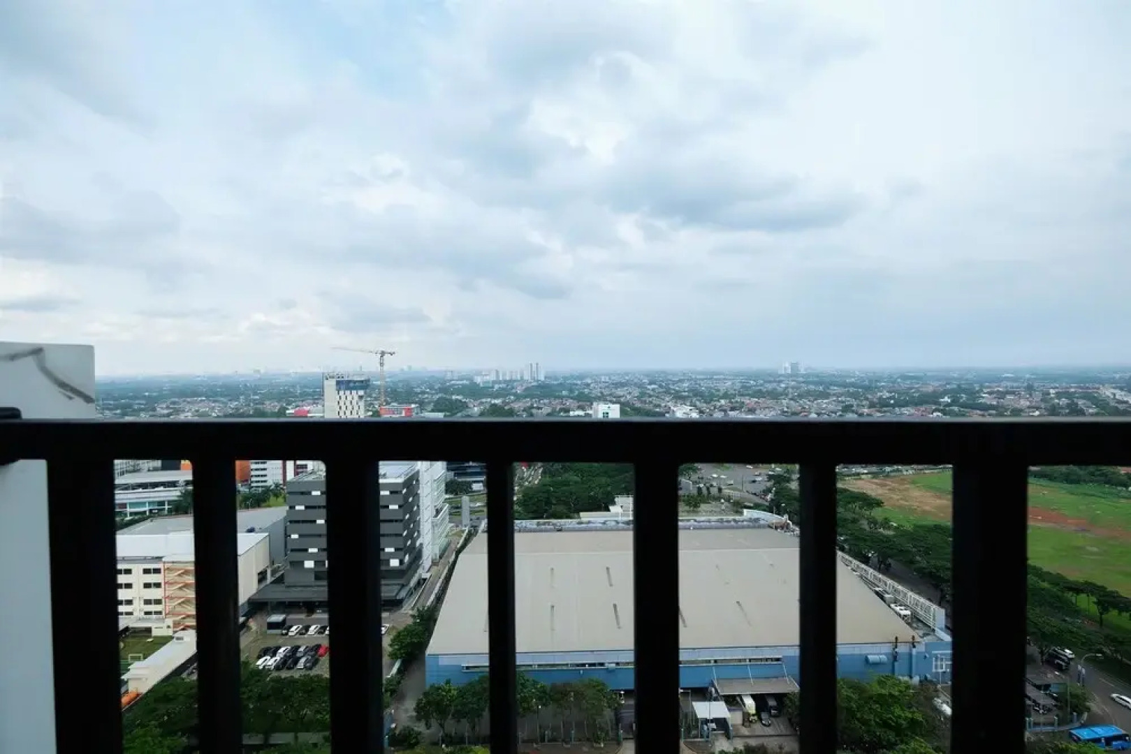 Homey Studio Room Tree Park Apartment near BSD City By Travelio