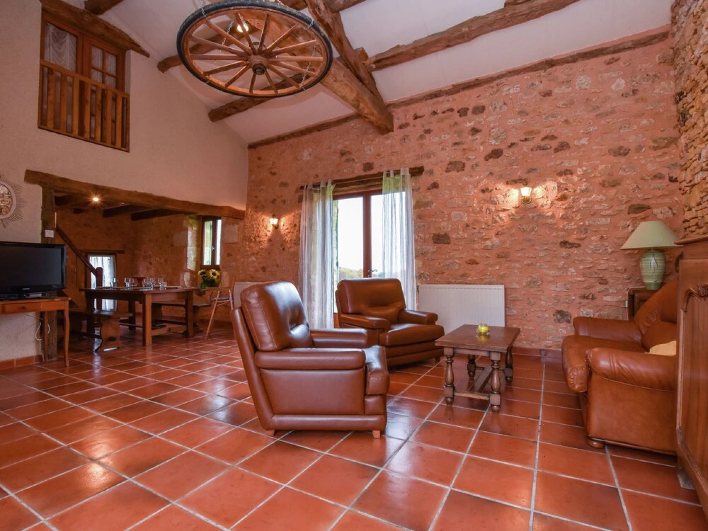 Lovely holiday home in Biron with fenced swimming pool