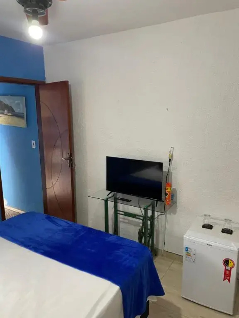 Suíte com varanda vista piscina