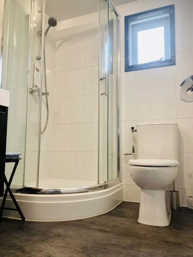 Chalet Gaby With Sauna, Private Dock, and Canoes at Lauwersmeer