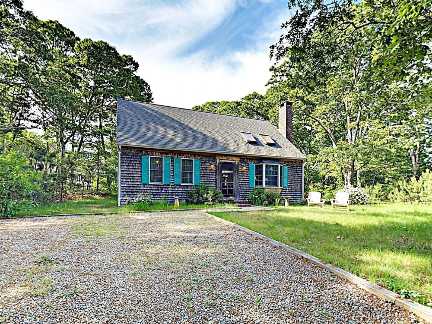 Woodsy Cape Cod Home by RedAwning