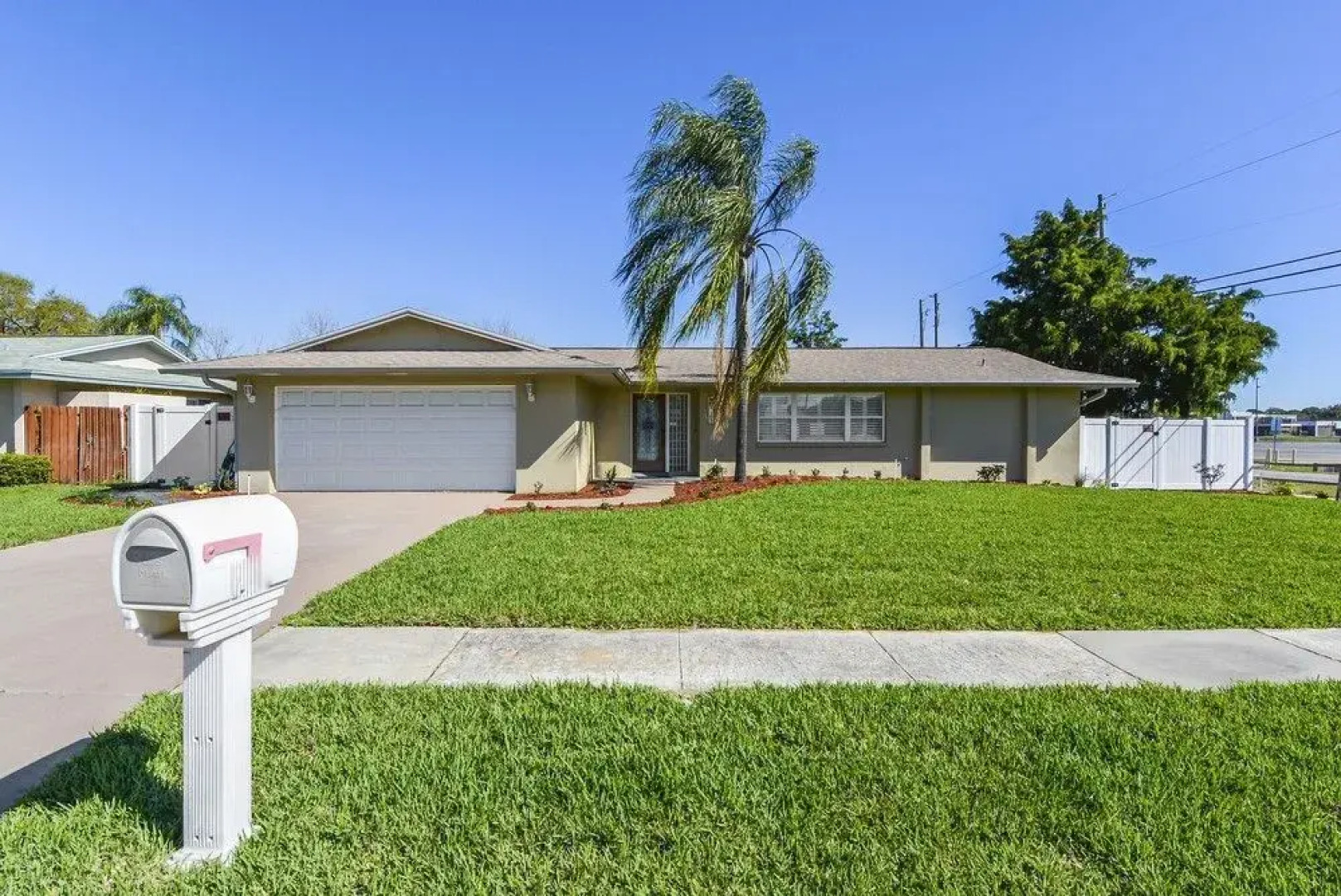 Resort Style Seminole Home by RedAwning