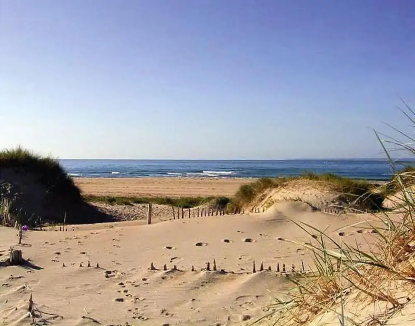Wooden House by Beach Near Barneville