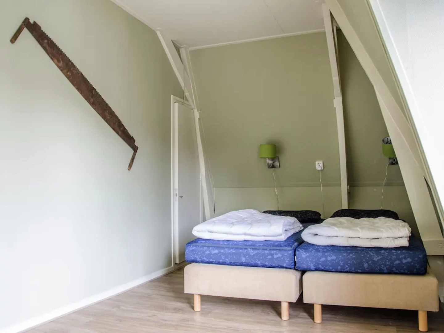 Characteristic house with a garden, surrounded by forest