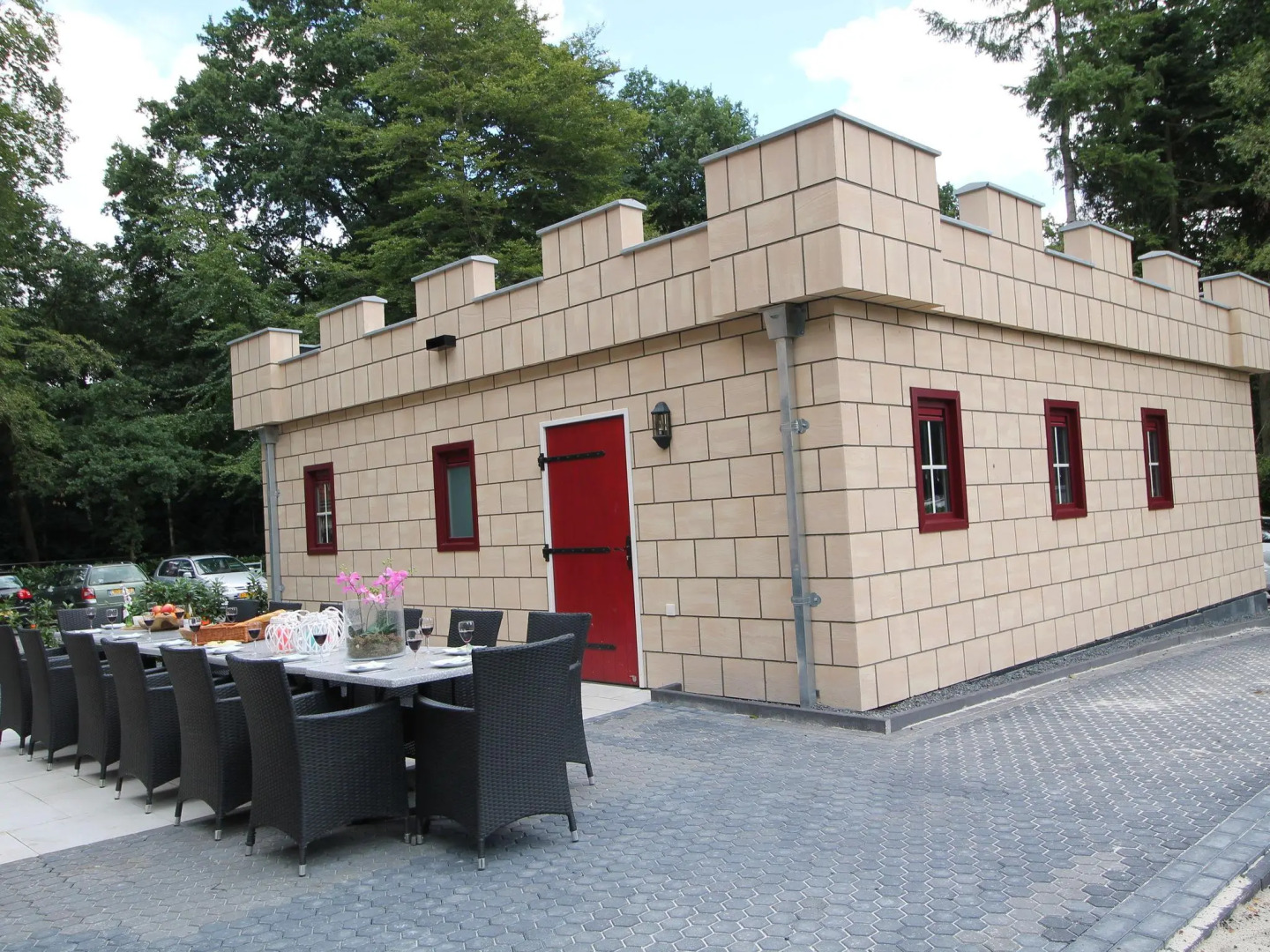 Designed home with bedstead, surrounded by forest