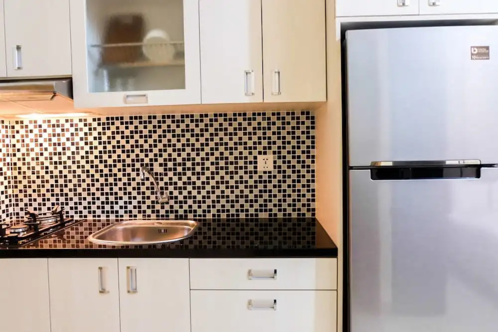 Warm and Homey Studio at The Oasis Cikarang Apartment By Travelio