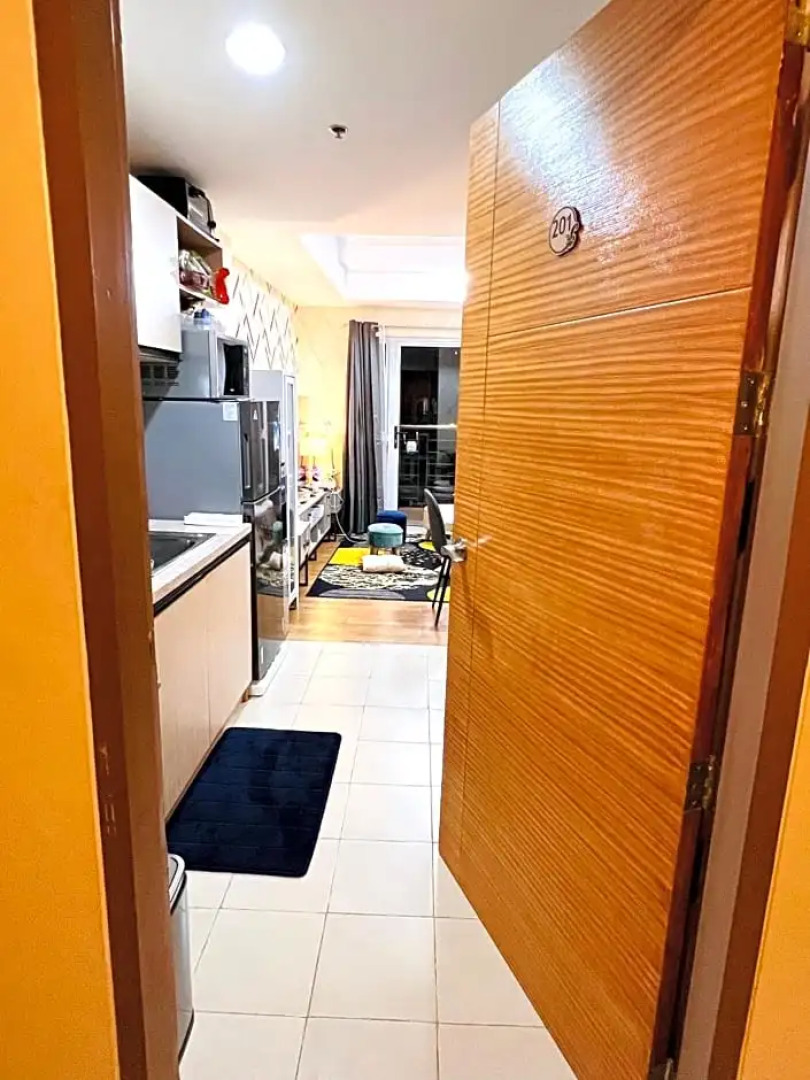 New Cozy 2 bedroom unit condotel for staycation with living room and kitchen set with pool