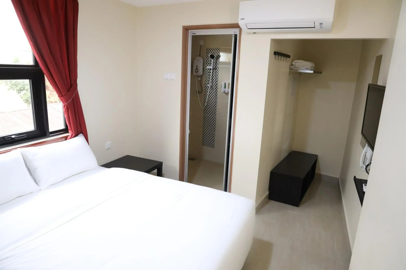 Capital O 90897 Island City Hotel