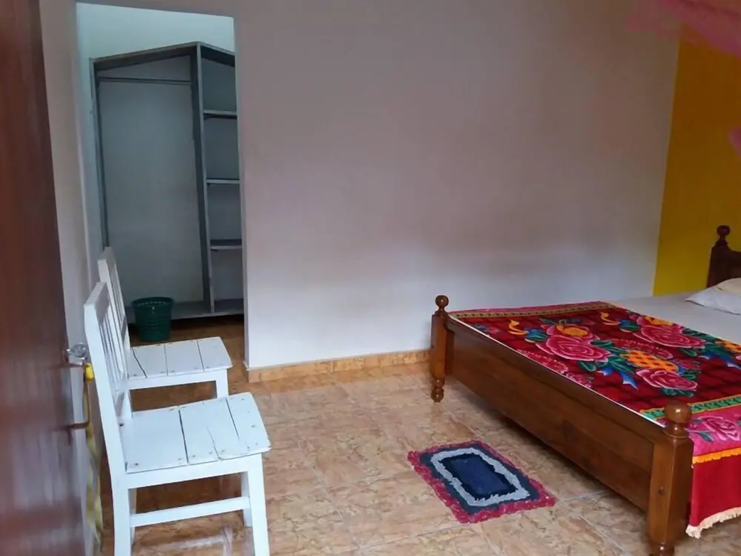 Malika's Yellow House