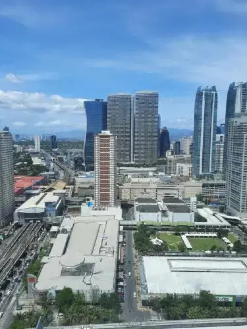 Cozy 1BR with balcony at Fame Residences