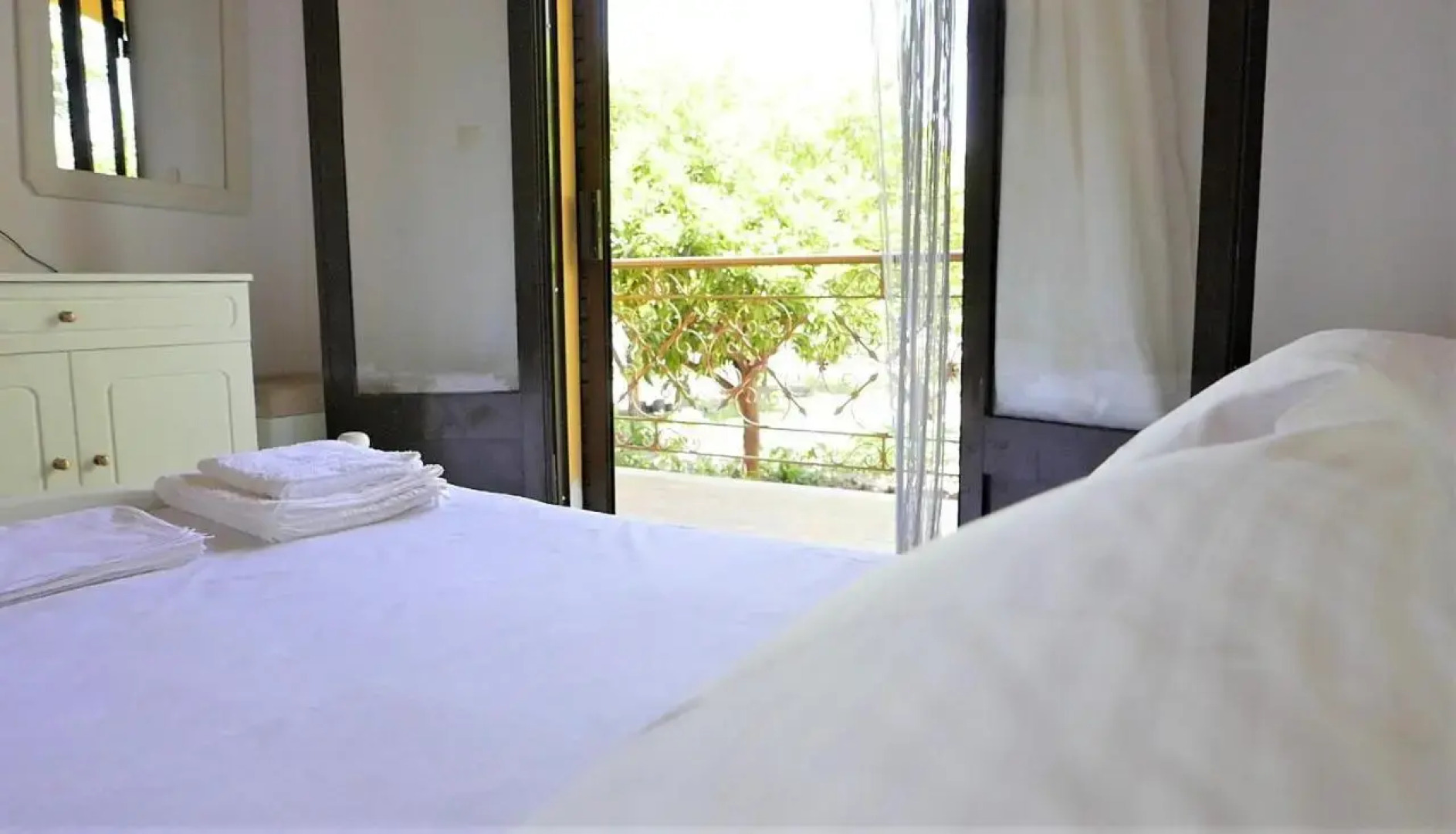 Amarynthos Beachfront Vacation House with garden