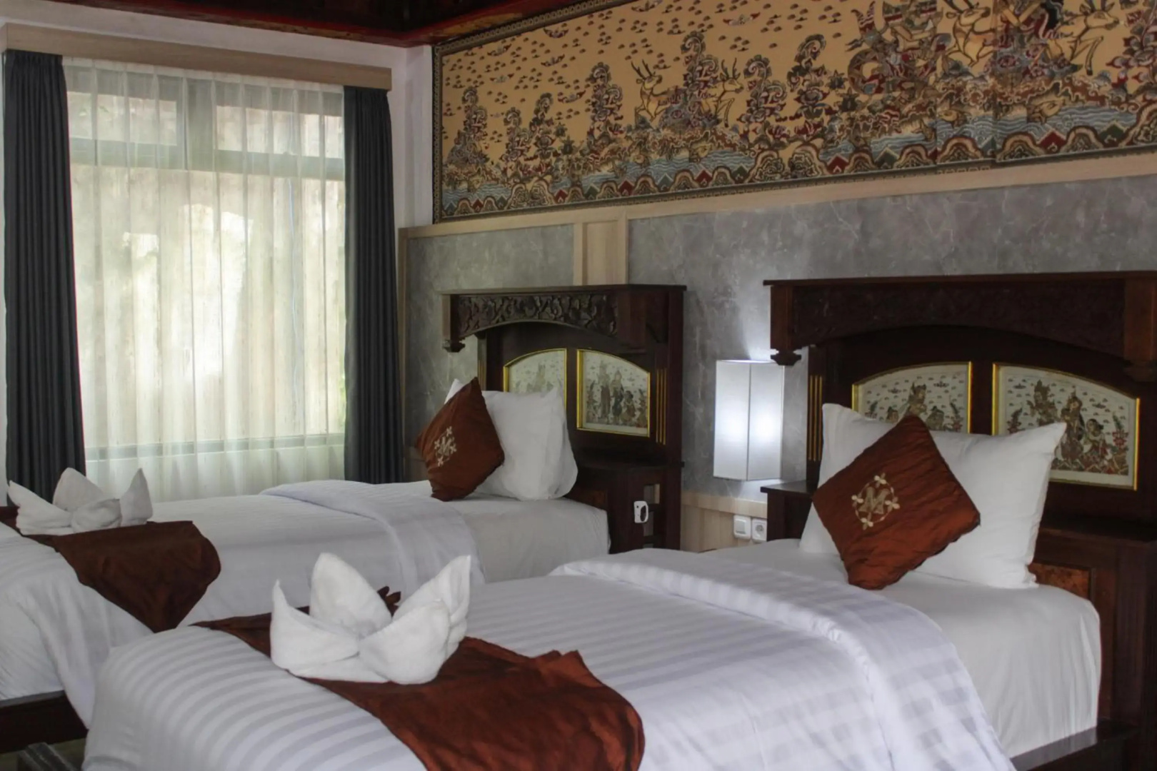 Отель Melasti Kuta Beach Hotel and Spa