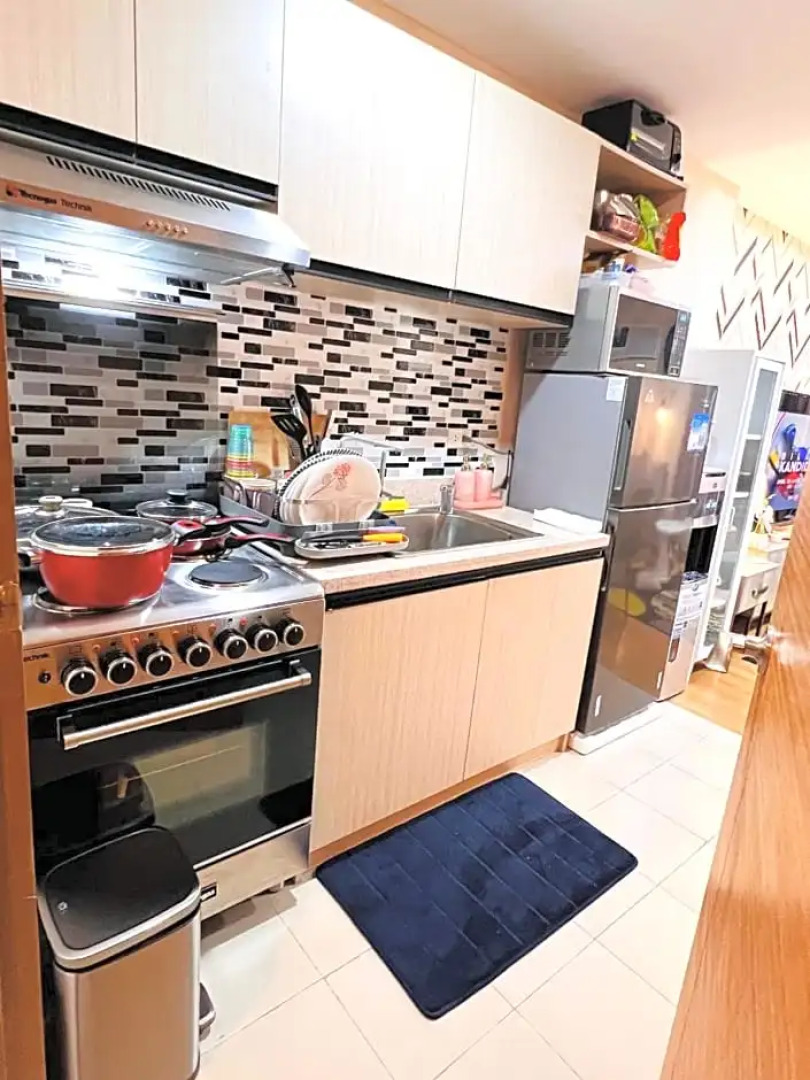 New Cozy 2 bedroom unit condotel for staycation with living room and kitchen set with pool