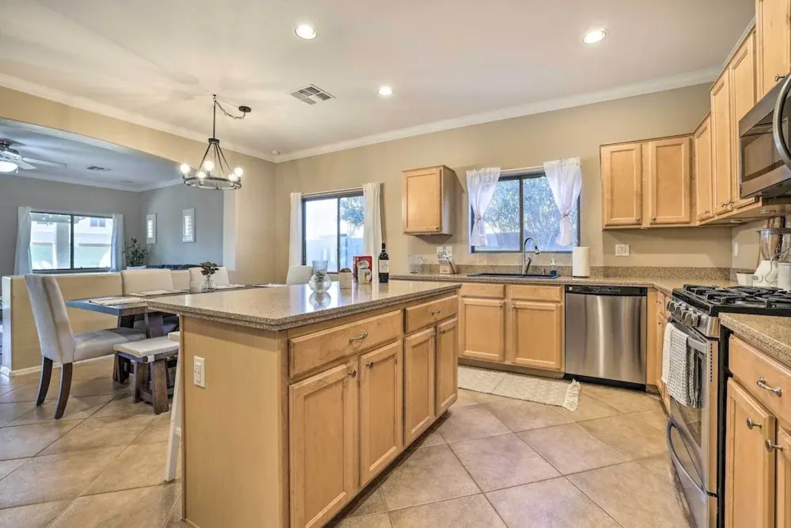 Sun-dappled Goodyear Home: Fire Pit, Pool, Patio