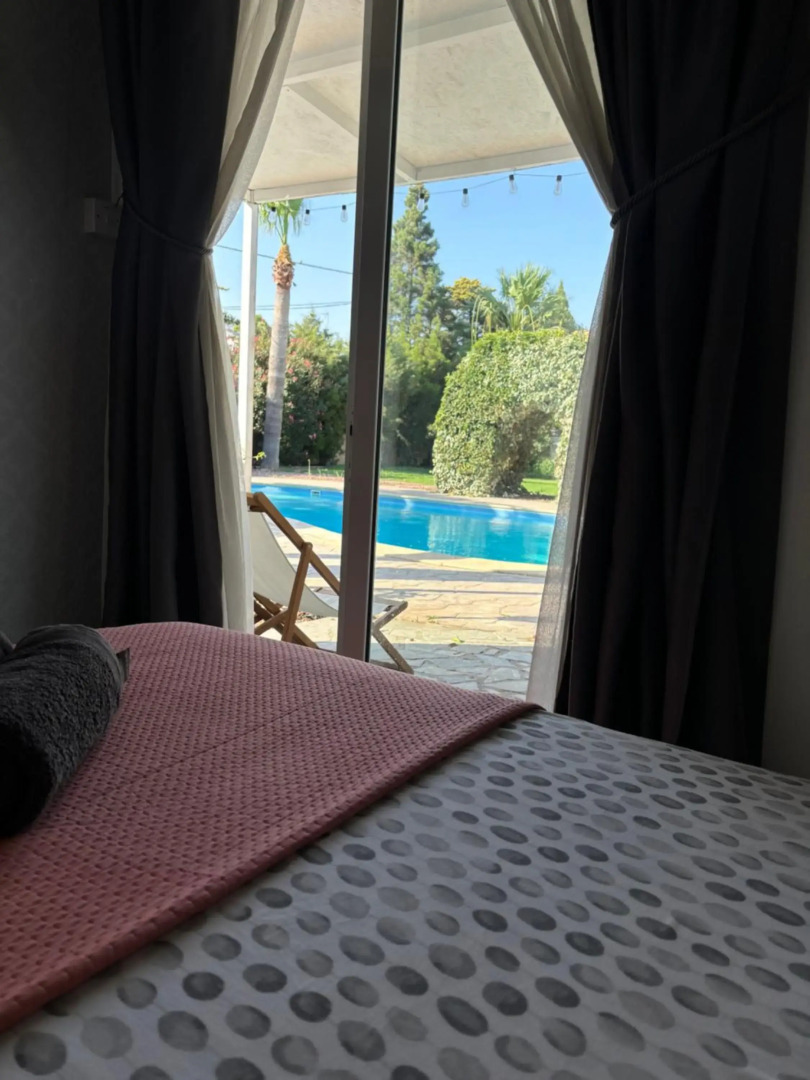 Mediterranean poolside garden cottage