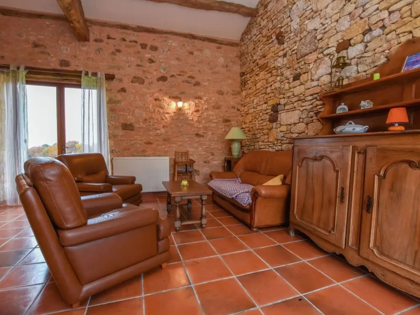 Lovely holiday home in Biron with fenced swimming pool