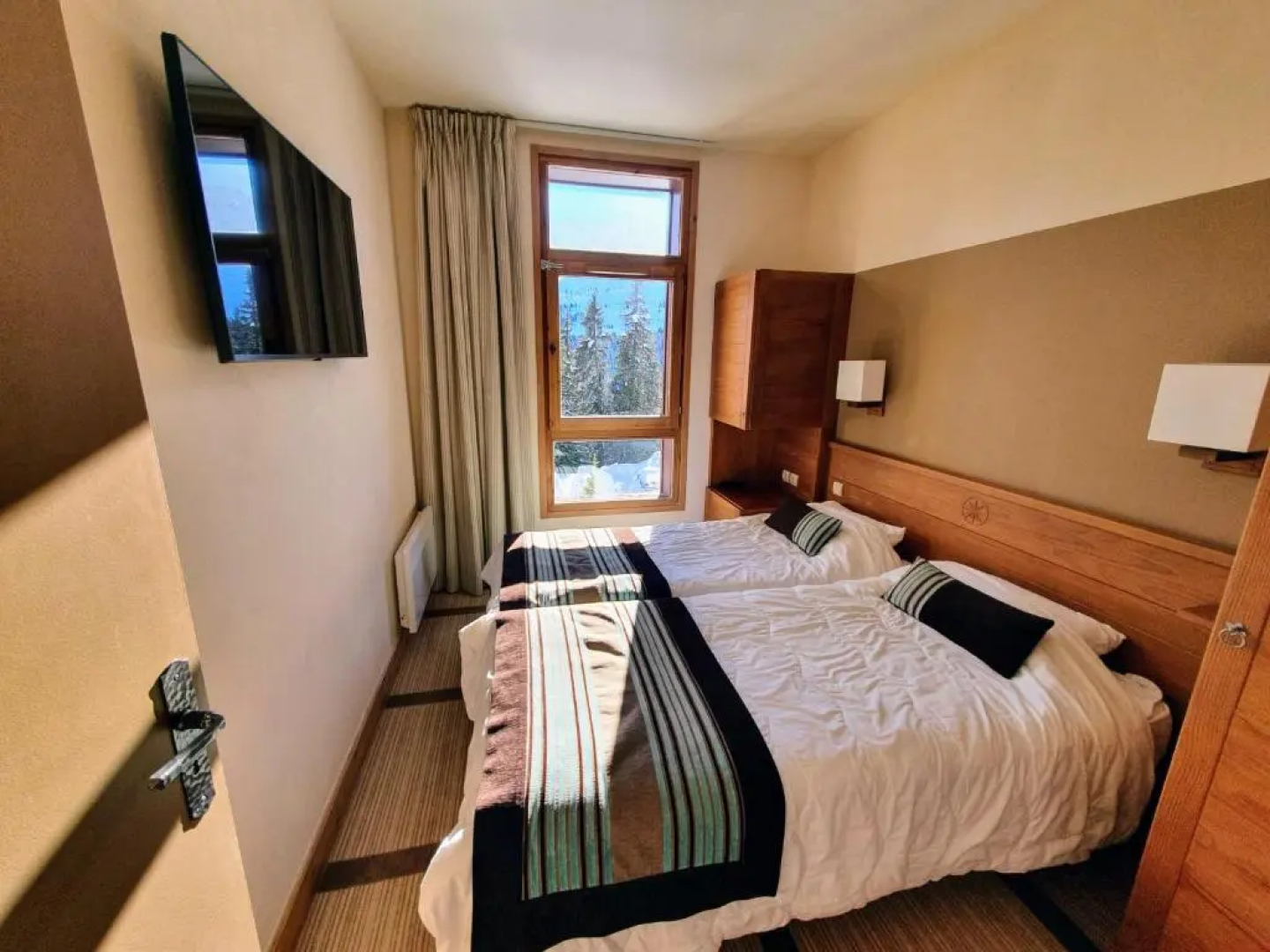 Appartement Premium à Flaine, altitude 1740 m, 8 à 10 personnes, au pied des pistes, piscine, jacuzzi, sauna, hammam et salle de sport