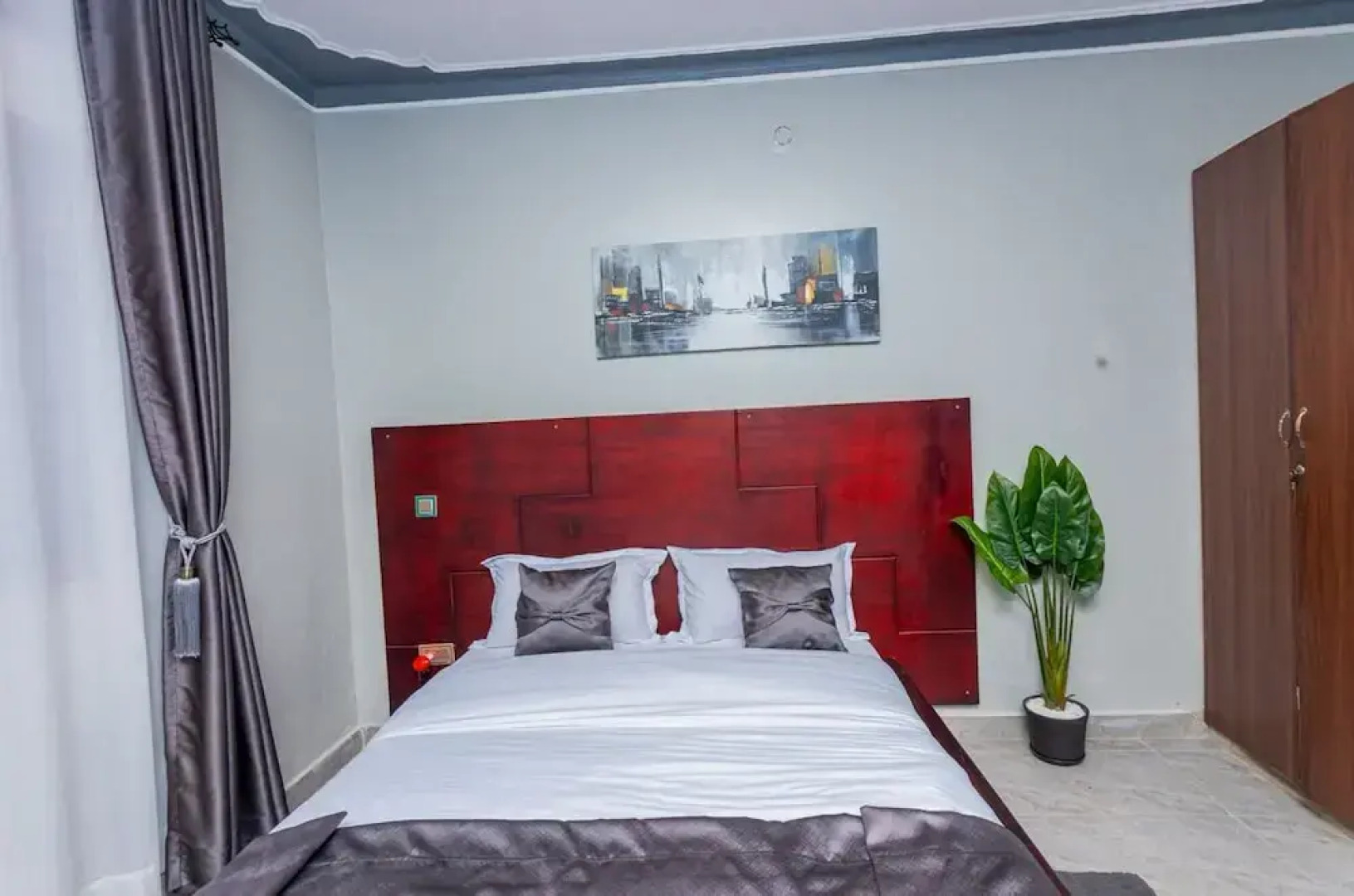 The Den Soroti White