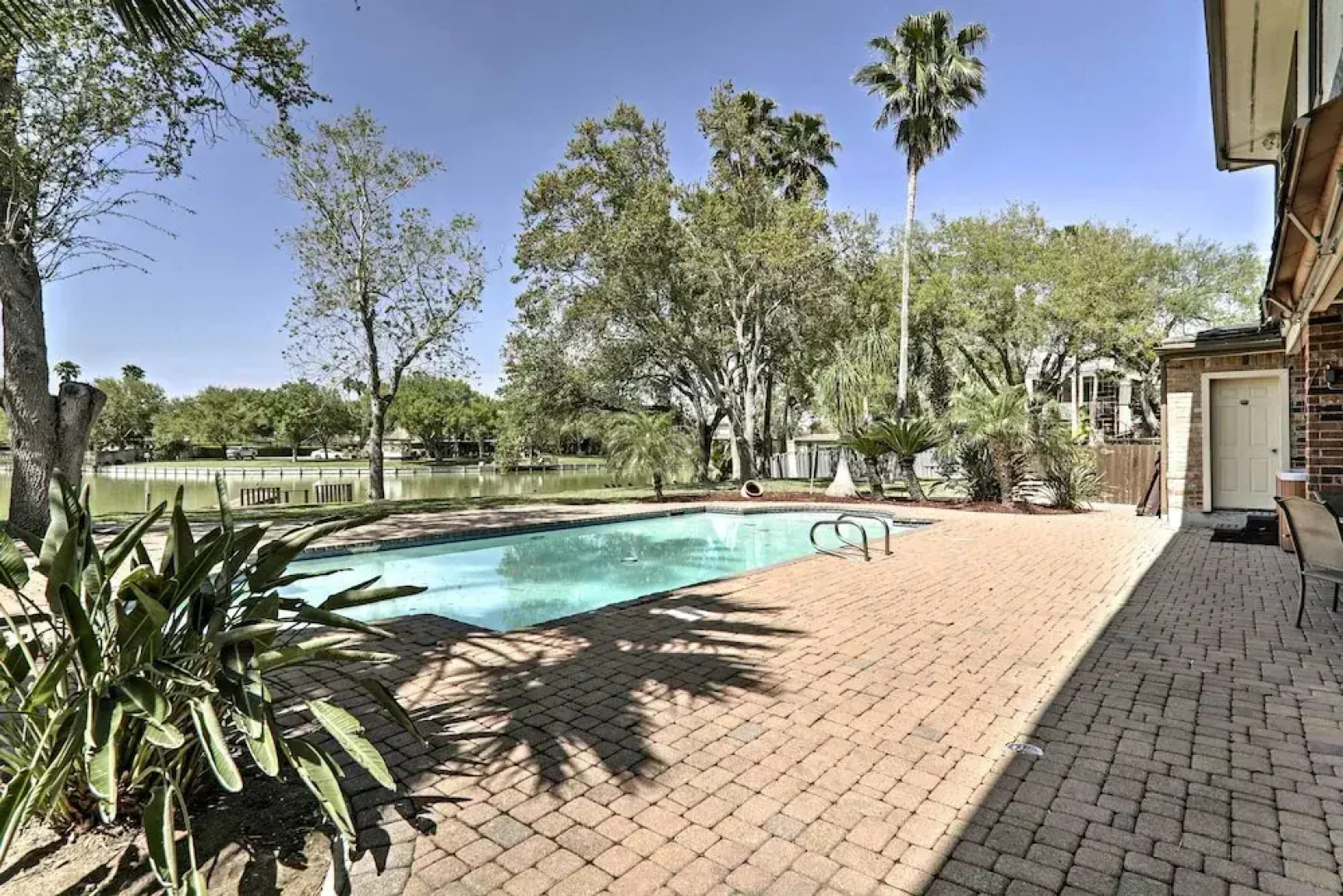 Pool & Hot Tub: Lakefront Harlingen Home