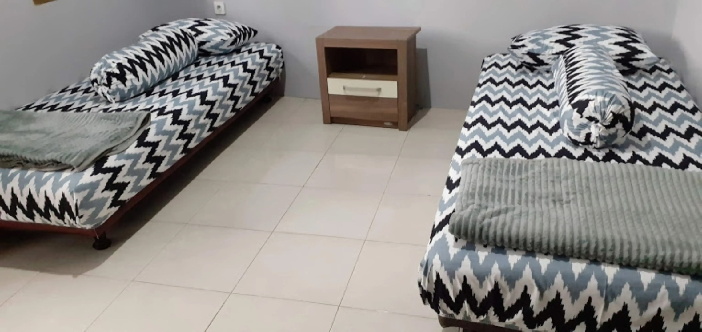 Nabila Syar i Guesthouse by ZUZU