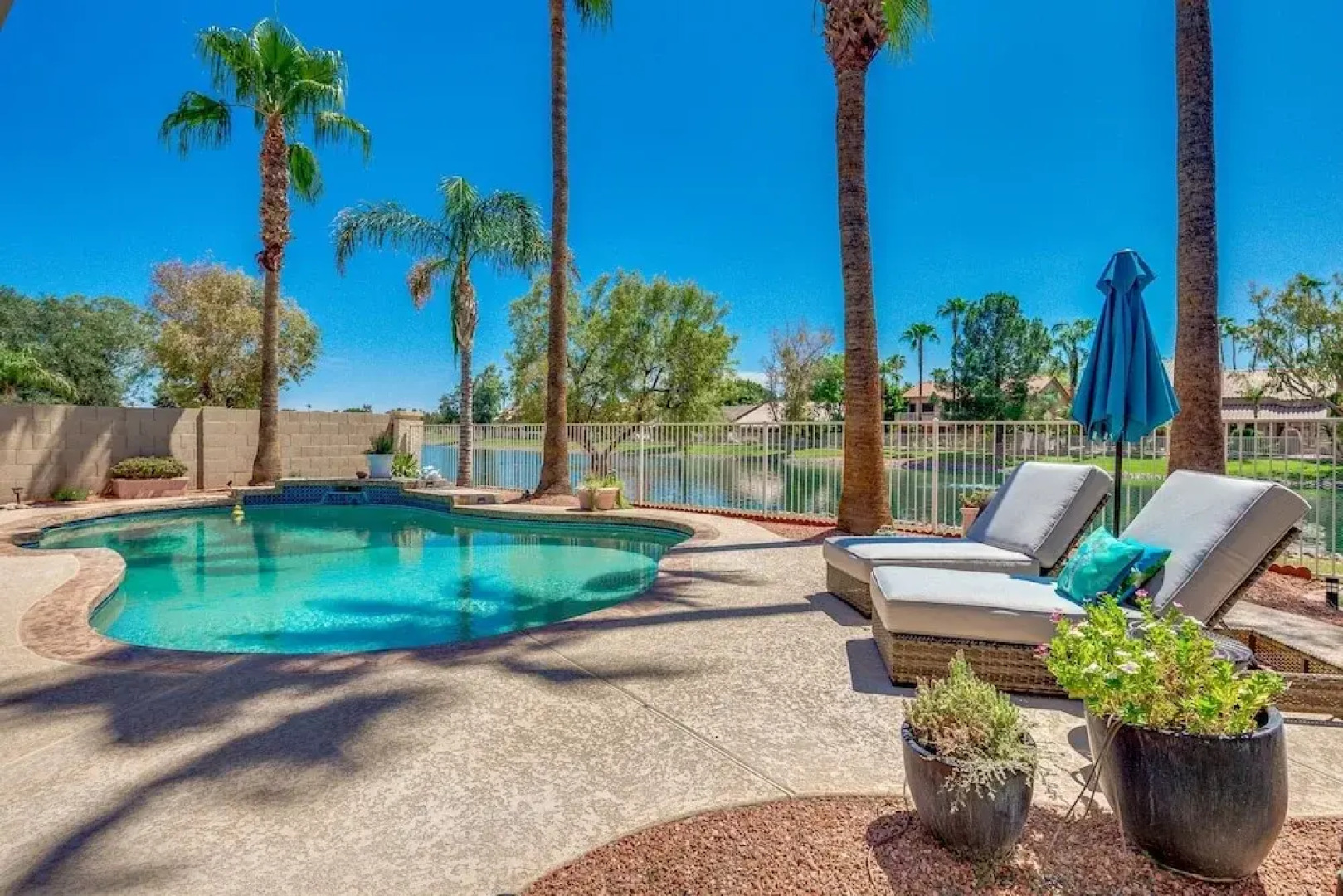 Updated Waterfront Home W/ Private Heated Pool & Garage. Near Arrowhead Shops! By Redawning