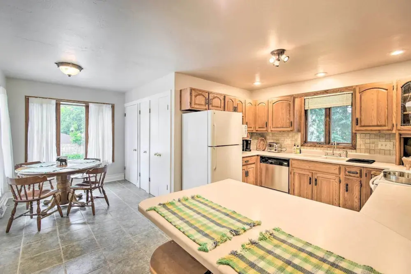 Walkable Lake Elkhart Apt: Dine, Shop, Swim!