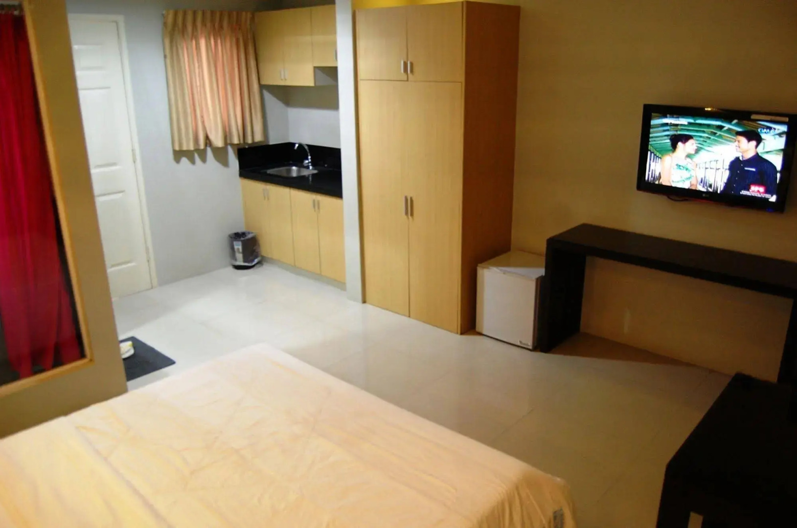 Rumi Apartelle Hotel