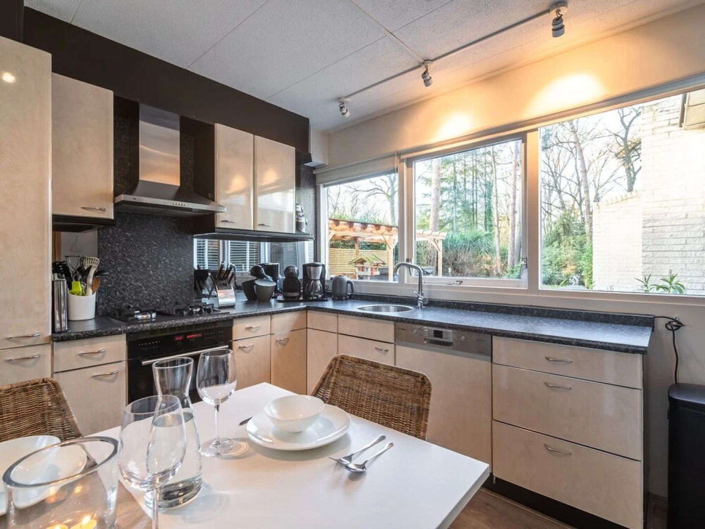 Detached villa with enclosed wooded garden with lawn, jacuzzi and infrared sauna