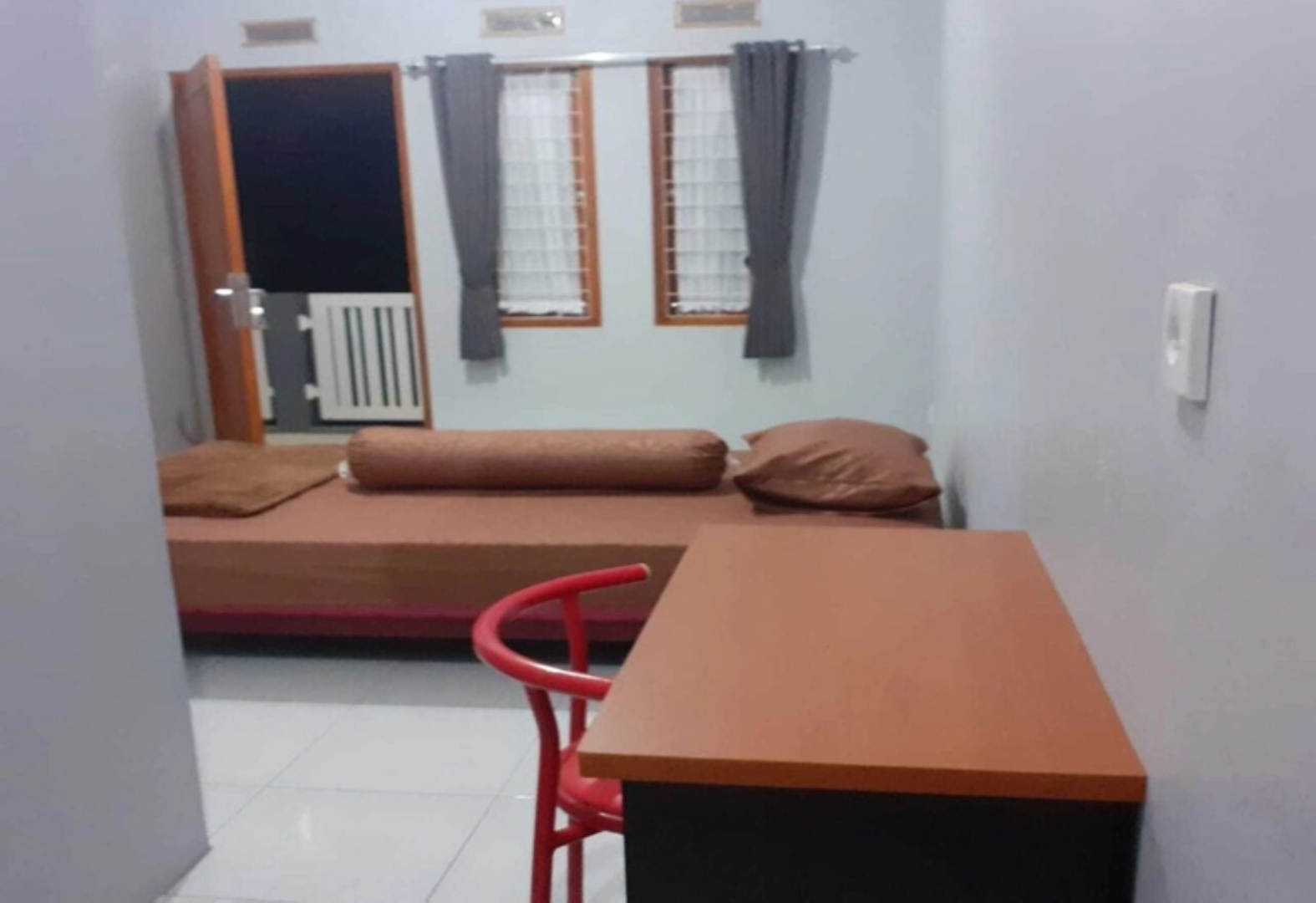 Nabila Syar i Guesthouse by ZUZU
