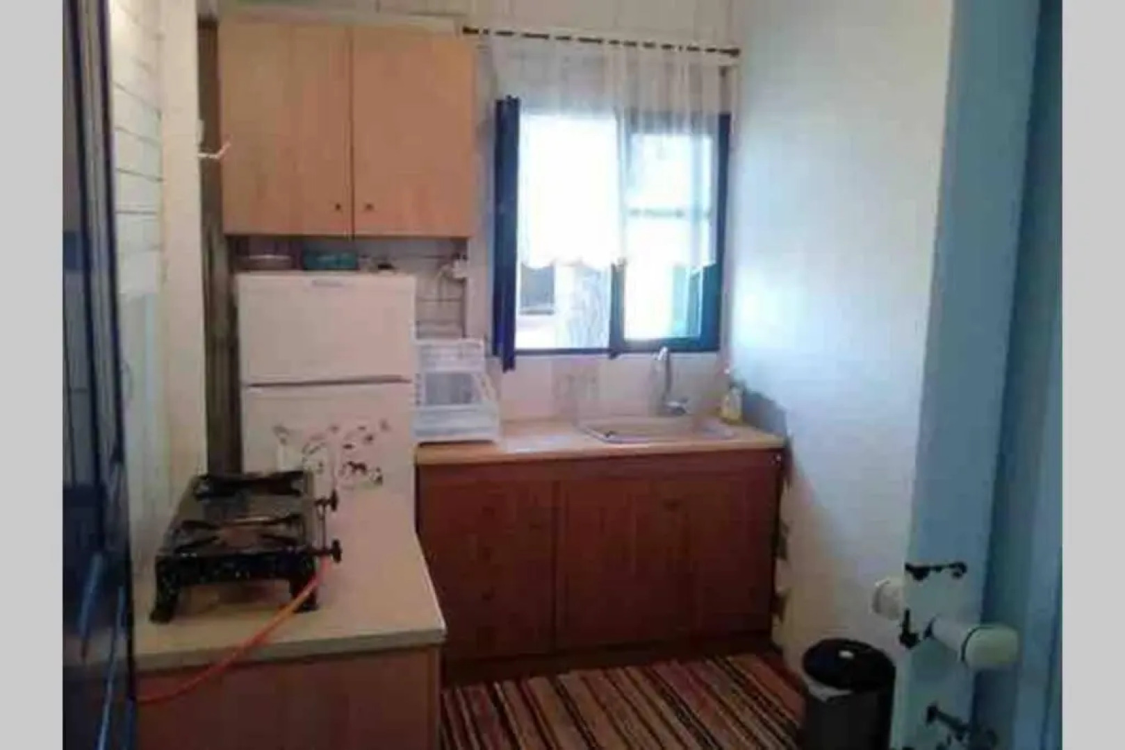 Wooden beach house / Nea Roda, Halkidiki