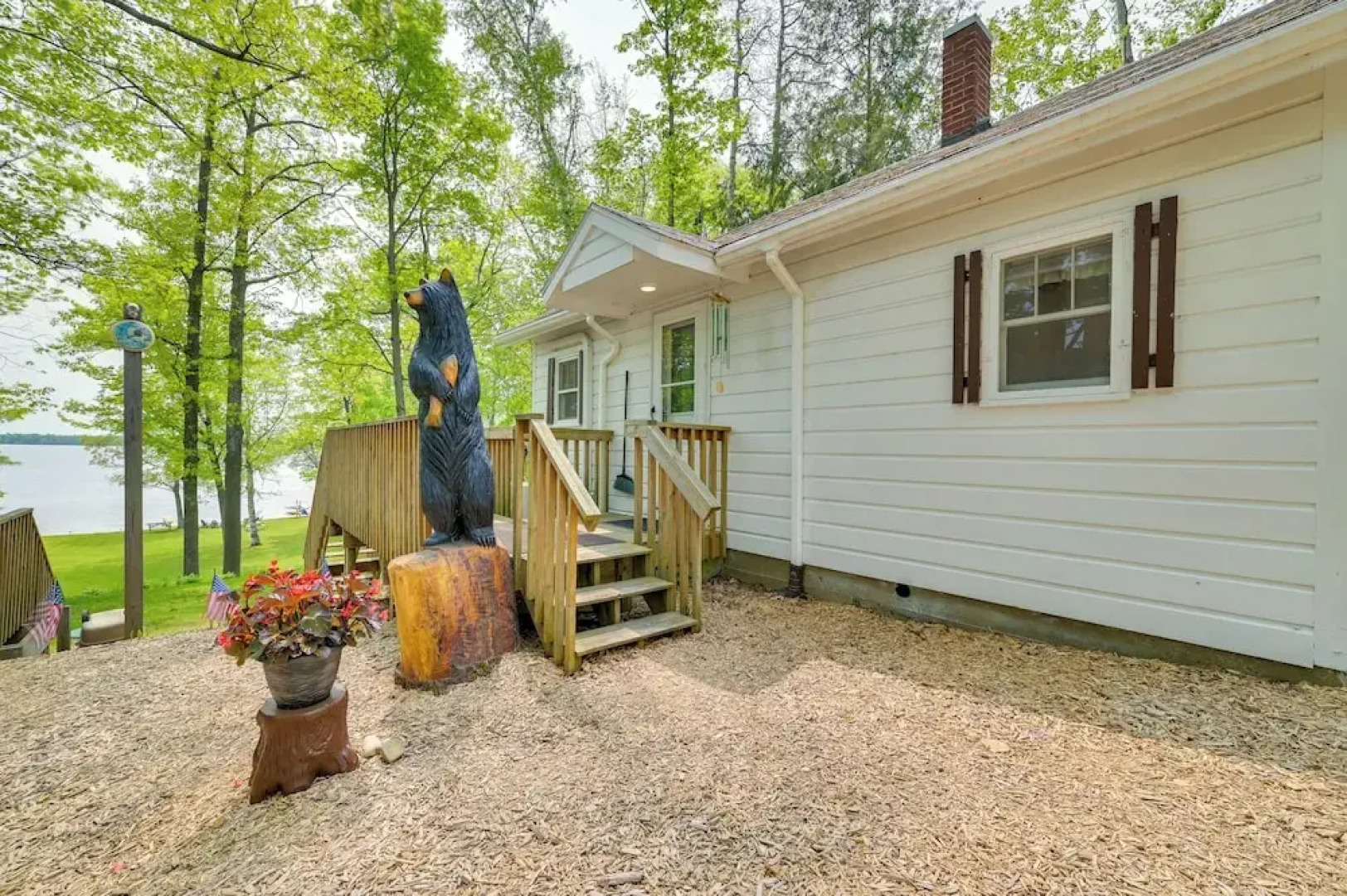 Cozy Carp Lake Cottage w/ Dock, Kayaks & Fire Pit