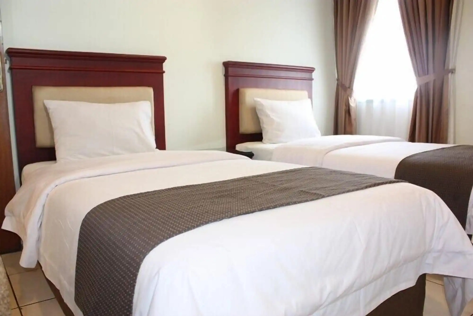Travellers Suites Serviced Apartments