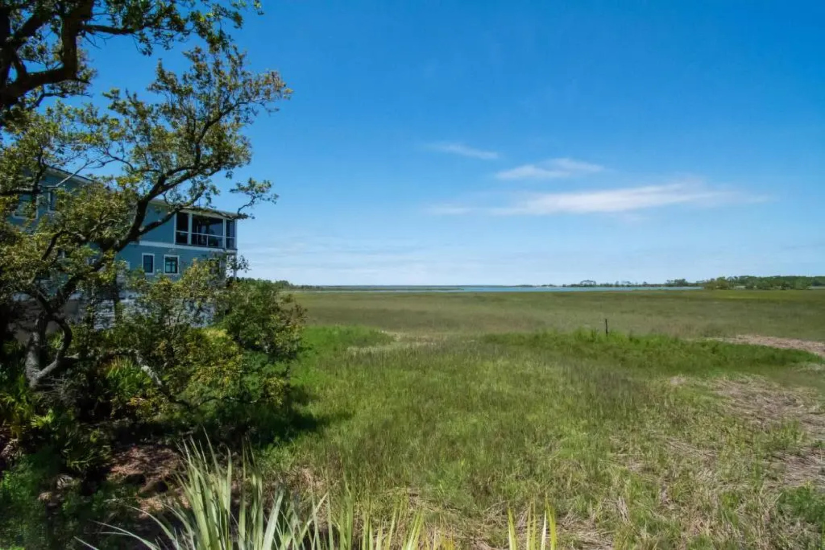 Stunning Marsh & Water Views in This Completely Renovated Three Bedroom Home