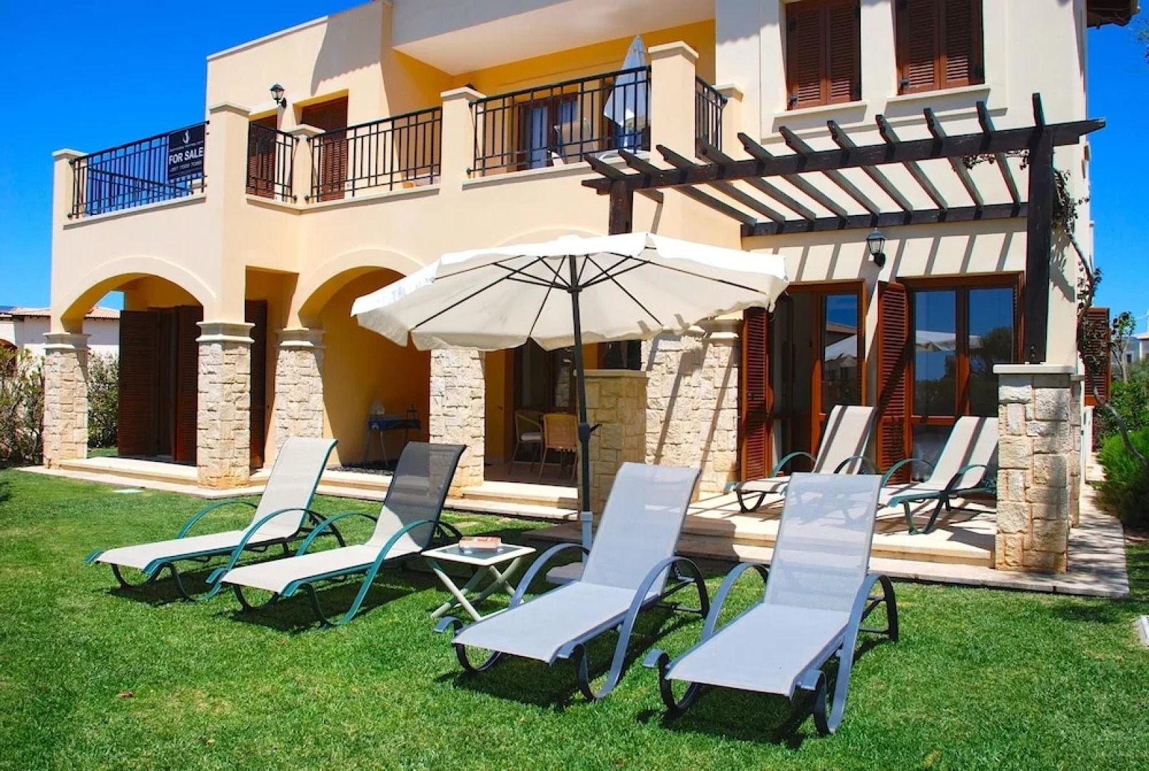 Charming 2 bedroom ground floor apartment 'CB01' - with private garden, communal pool and resort facilities, Theseus Village on Aphrodite Hill