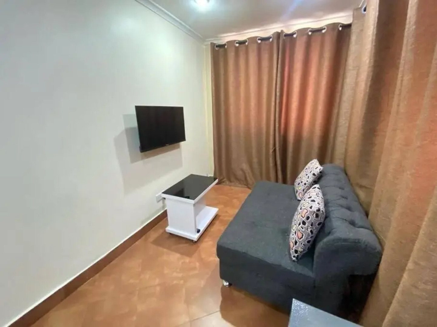 Mikocheni Studio APartment with a car