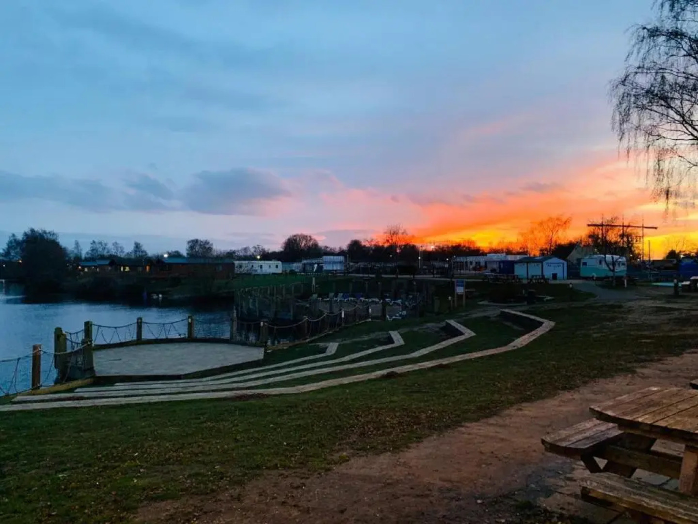 Woodpecker Log Cabin with hot tub, pizza oven bbq entertainment area, lakeside with private fishing peg situated at Tattershall Lakes