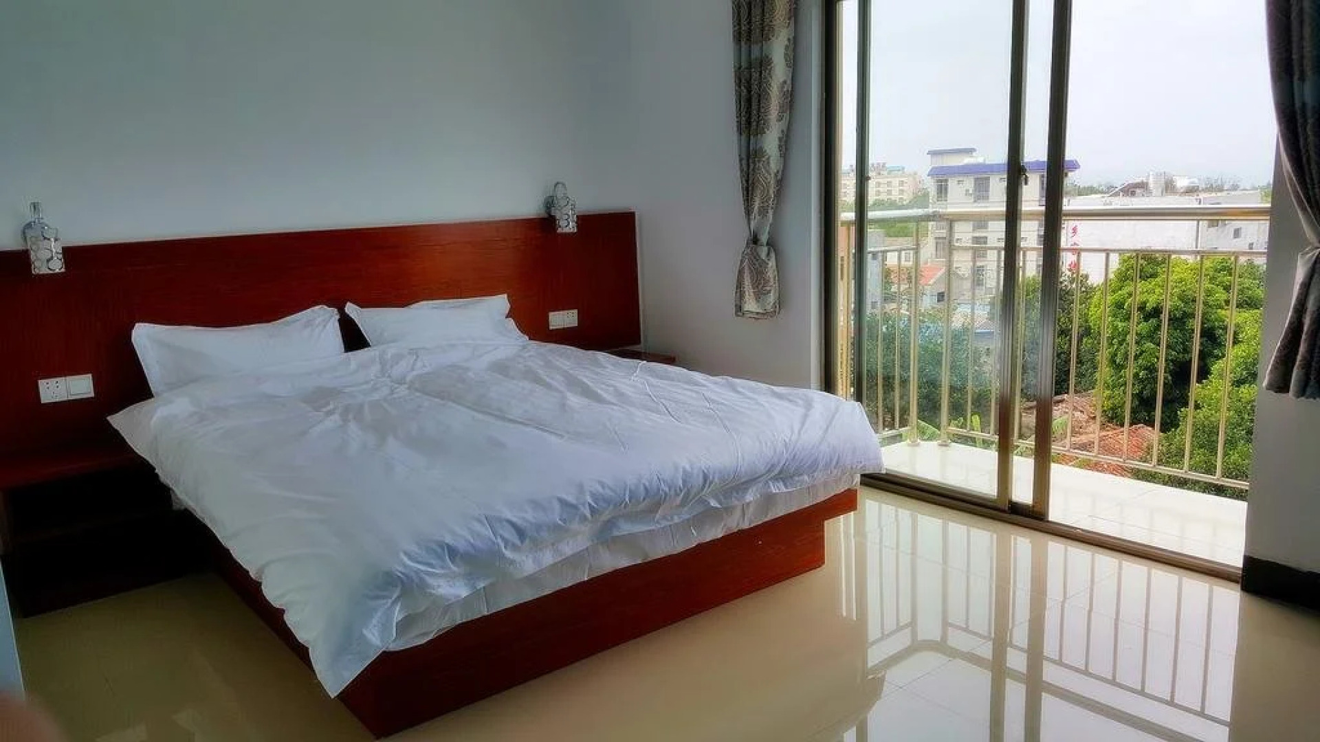 Weizhou Island Wan Jia Deng Huo Inn