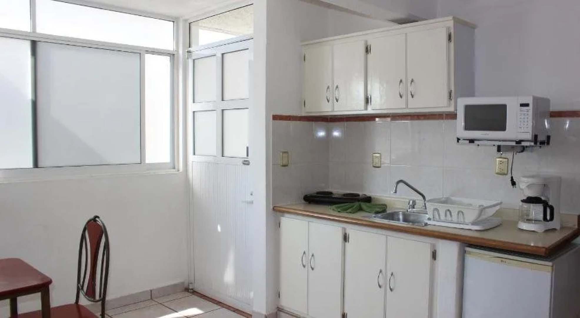 Capital O Hotel Suites Andrade