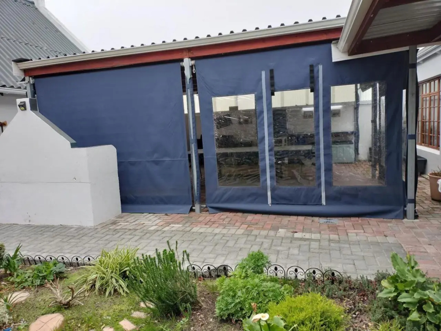 Cozy 4 bedroom house enclosed by sea and mountain.