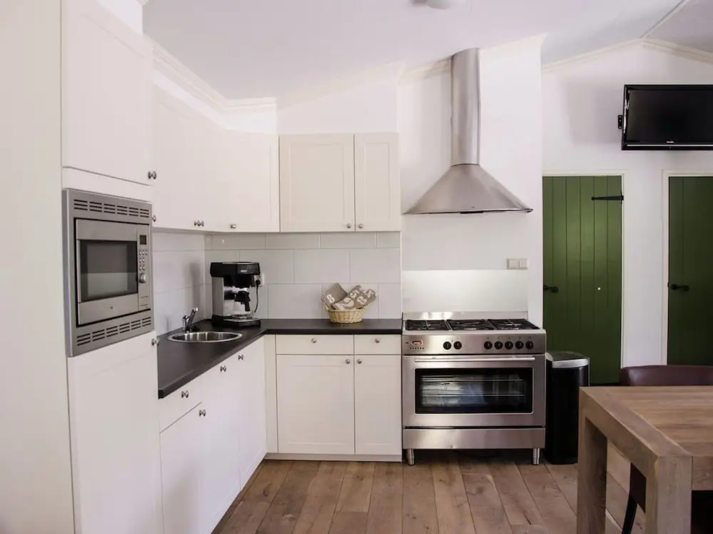 Nice house with a garden, surrounded by forest