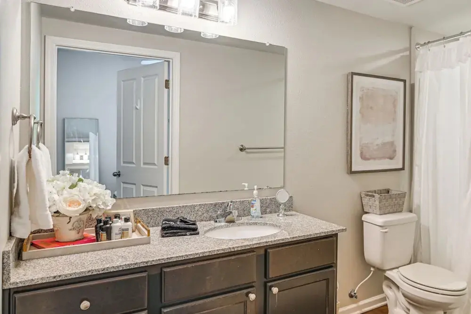 Cotton District Condo: Walkable Spot for Game Day!