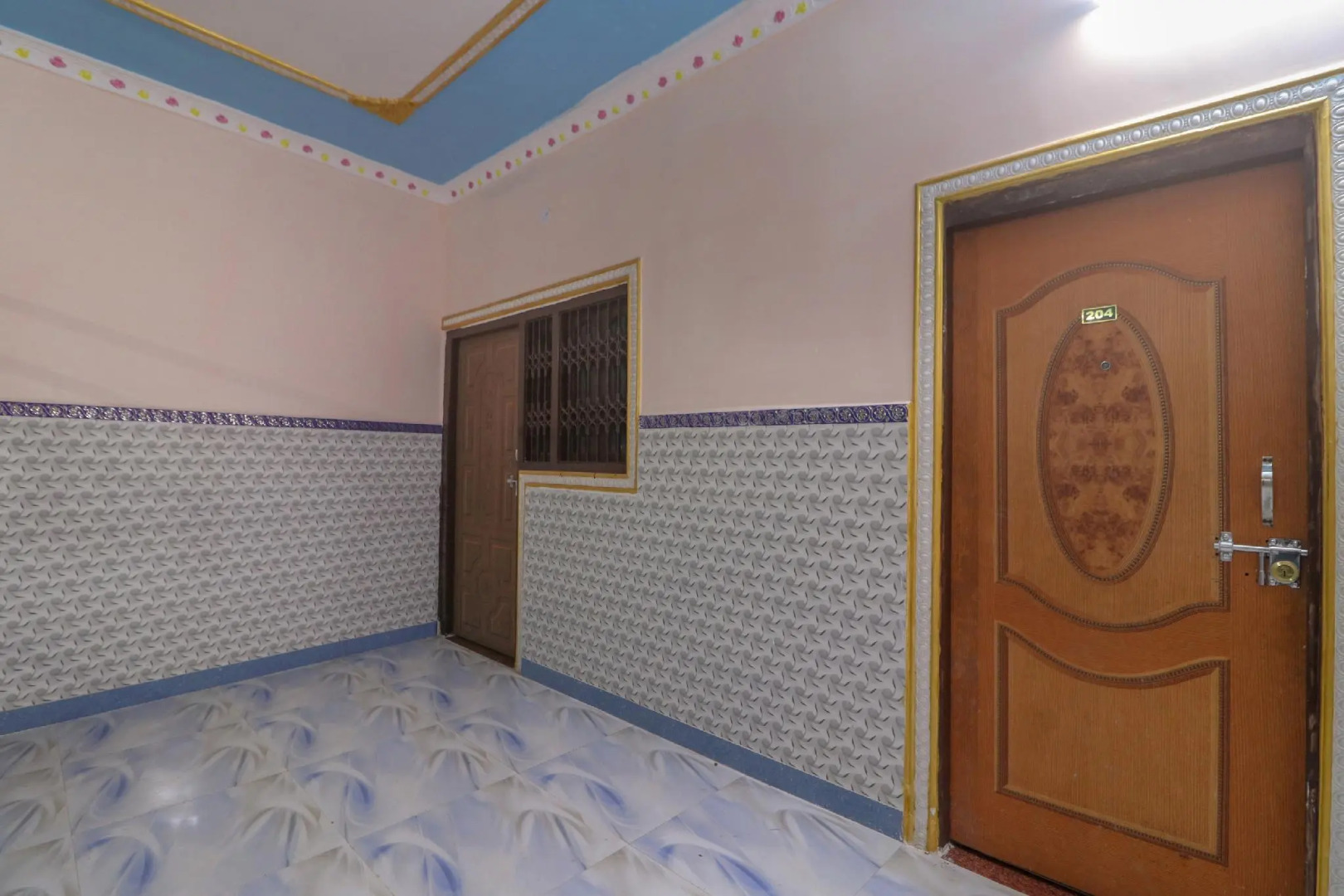 SPOT ON 62860 Hotel Happy Palace