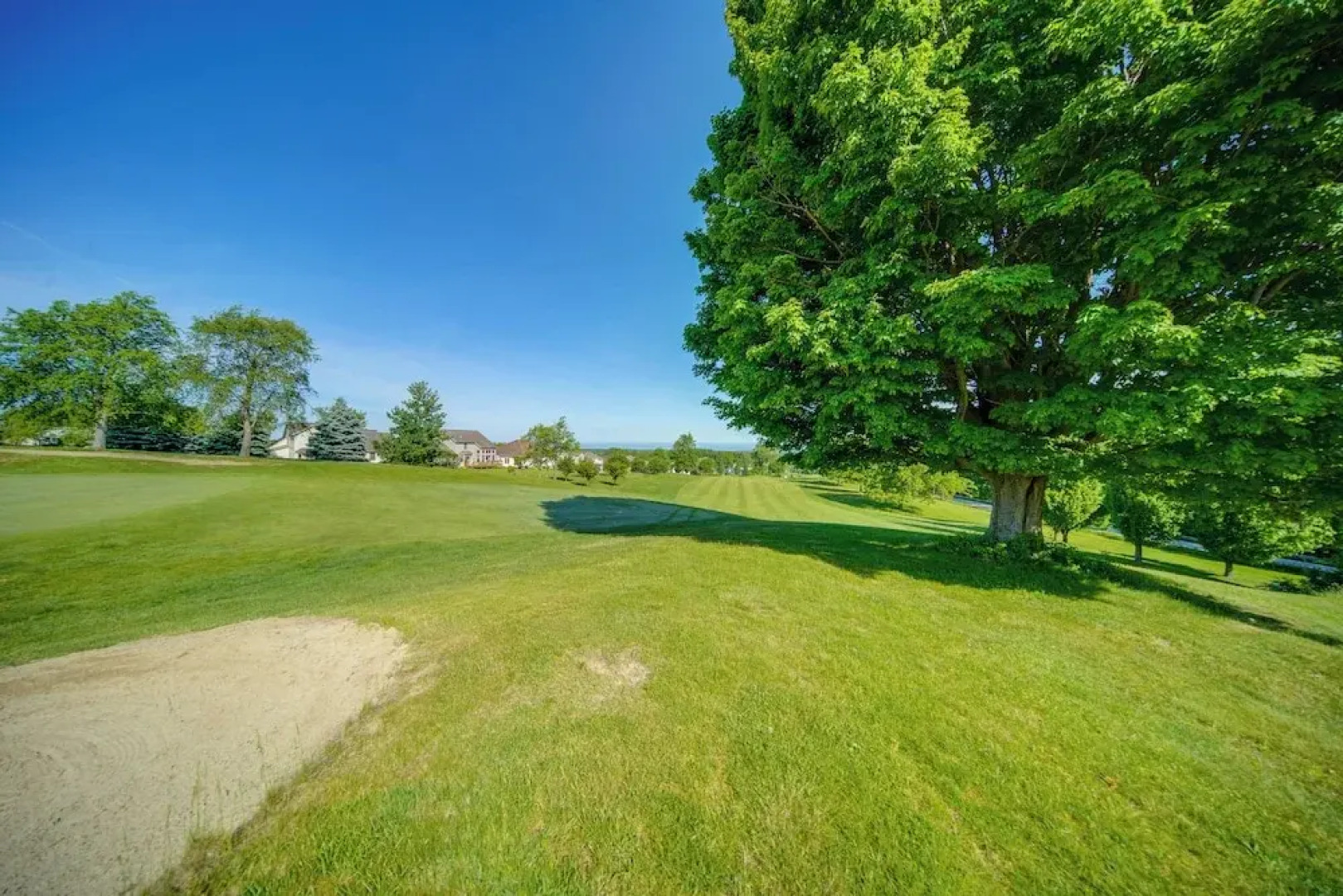 Golf Course View: Centrally Located Condo in Erie