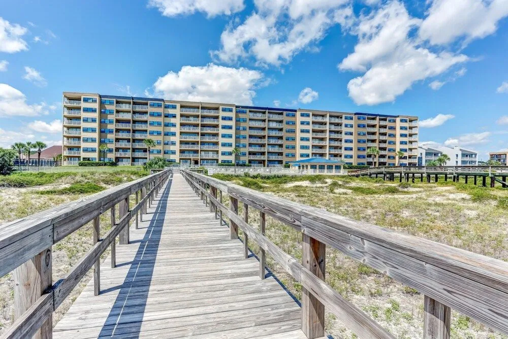 North End Corner Unit with View of the Ocean and Miles of Sandy Beach by RedAwning